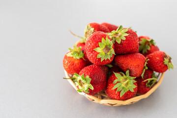 strawberries in a wicker plate