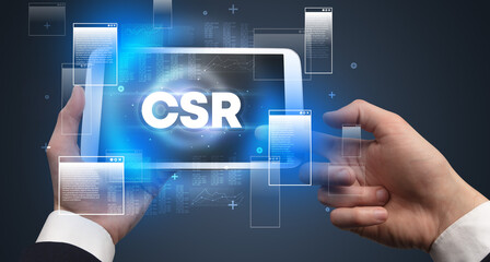 Close-up of a hand holding tablet