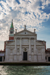Fototapeta na wymiar The west front of the Chiesa di San Giorgio Maggiore at early morning from a yacht in the Bacino di San Marco, Venice, Italy