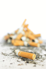 Cigarette butts and harmful consumption