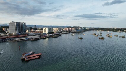 Fototapeta premium Kota Kinabalu, Sabah Malaysia – June 14, 2022: The Waterfront and Esplanade Area of Kota Kinabalu City Centre