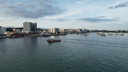 Fototapeta premium Kota Kinabalu, Sabah Malaysia – June 14, 2022: The Waterfront and Esplanade Area of Kota Kinabalu City Centre