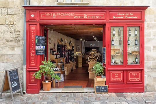 SAINT-EMILION, FRANCE - SEPTEMBER 07, 2017:  Pretty shop selling Wine and Cheese in the centre of town.