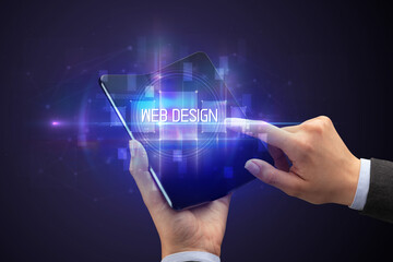 Businessman holding a foldable smartphone