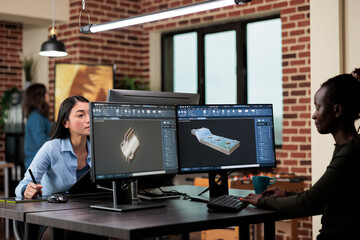 Digital engineer developing prototype mesh using modern computer while sitting at desk in office. Creative company professional modeler creating 3D model using specialized software.