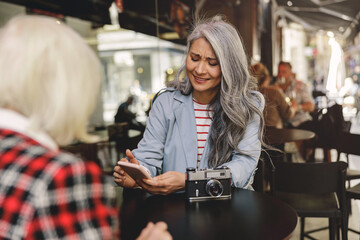 Urban women during coffee time in cafe