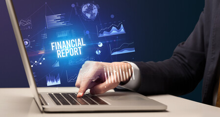 Businessman working on laptop, business concept