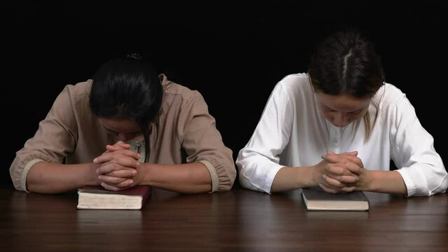 Religious young woman praying to God in the morning, spirtuality and religion, Religious concepts