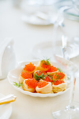 canape with caviar on catering table