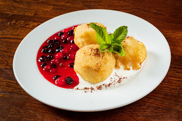 baked balls with berry compote