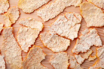 Tangerine peel on wooden table. Drying tangerine peel for adding to tea