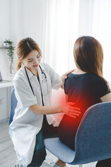 Obraz premium physical therapist Helping to heal and care for female patients physical therapy concept