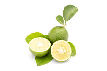 Slice of Thai Lime (Common Lime) or local lime isolated on white background. Food and healthcare concept