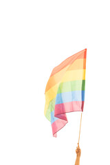 hand holding rainbow flag