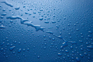 Background of wet blue surface