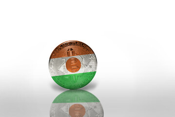 bitcoin with the national flag of niger on the white background. bitcoin mining concept.