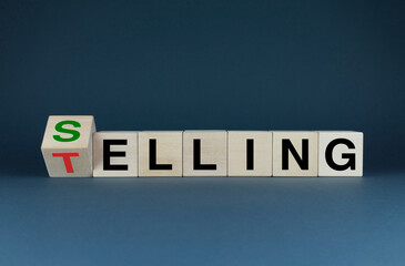 Selling or Telling. The cubes form the words Selling or Telling.