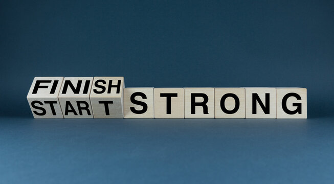 Start strong - Finish strong. The cubes form the words Start strong - Finish strong.