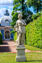 Obraz premium Marble statue in front of Grotto pavilion in the Catherine park at Tsarskoye Selo in Pushkin, Russia