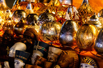 Electric luminous colorful mosaic lamps in oriental style as tourist souvenirs at night street market in Sharm El Sheikh, Egypt