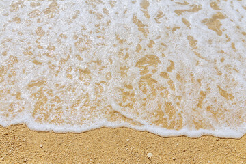 The Mediterranean Sea washes the sandy beach.