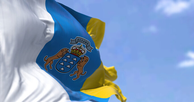 The Canary Islands flag waving in the wind on a clear day
