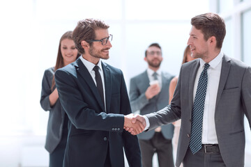 Fototapeta premium handshake business people in the office corridor