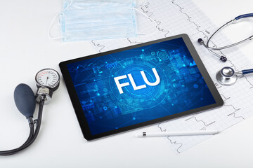 Close-up view of a tablet pc with medical abbreviation