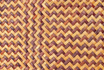 Naklejka premium Old bamboo weaving pattern, woven rattan mat texture for background and design art work