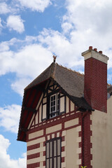 Magnificent traditional Nomandy half-timbered facades, partially blurred and unfocused