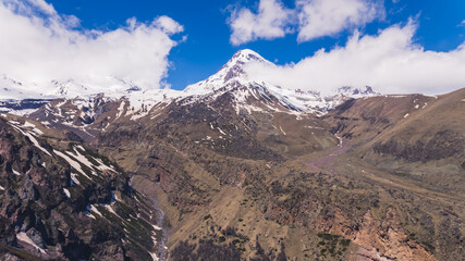 scenic view of snowcapped mountains Mkinvartsveri, Kazbegi, Georgia. beautiful nature. High quality photo