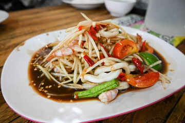 Thai papaya salad, mixed seafood papaya salad, ready to serve