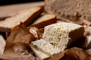 goat or sheep cheese and bread on the table