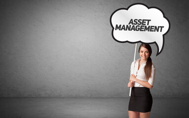 business person in casual holding road sign