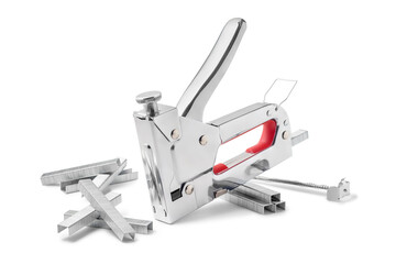 Stapler gun and stack of metal staples isolated on white background. Industrial tool.