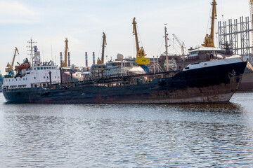 Fototapeta premium Russia, St. Petersburg, May 2022: Ship in cargo port
