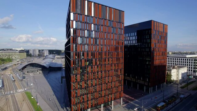 Ł&oacute;dź city on a sunny day. Characteristic places, buildings and streets. Piotrkowska Street from the bird's eye view.
