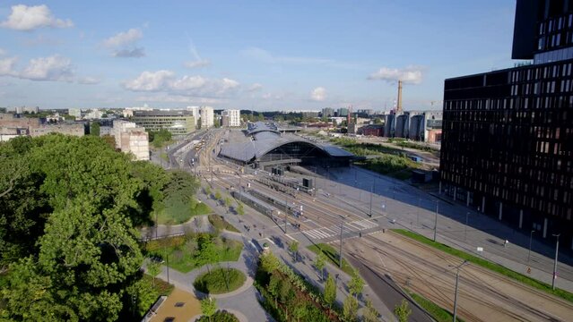 Ł&oacute;dź city on a sunny day. Characteristic places, buildings and streets. Piotrkowska Street from the bird's eye view.