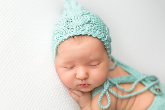 newborn little baby. first photo session of a newborn. baby on white background