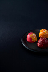 Sweet color chocolate bonbons. Modern hand painted chocolate candy. Product concept for chocolatier