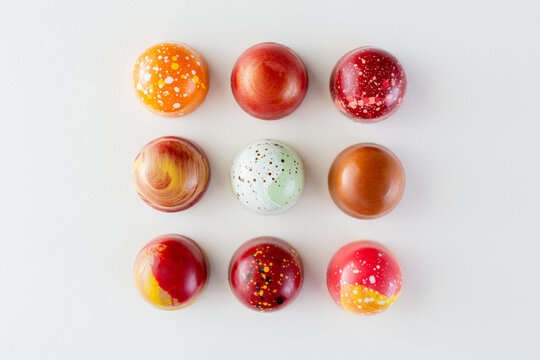 Assortment of painted chocolate pralines. Handcrafted bonbons.Delicious dessert.