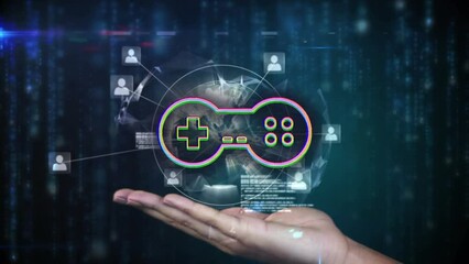 Animation of gamepad icon over data processing and hand holding globe - Powered by Adobe