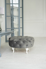 luxury grey velvet pouf. stylish white living room