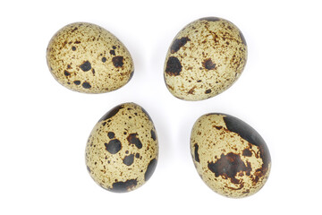 pile of quail eggs. isolated. with clipping path.