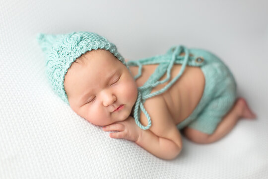 newborn little baby. first photo session of a newborn. baby on white background