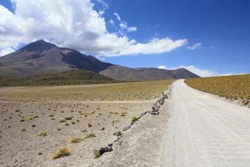 Landscape Or Mountains, sand, volcano And clounds At Atacama Desert In Chile