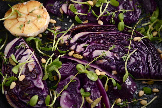 egetarian food red cabbage steak with greens and garlic