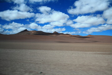 Fototapeta na wymiar Landscape Or Mountains, sand, And clounds At Atacama Desert In Chile