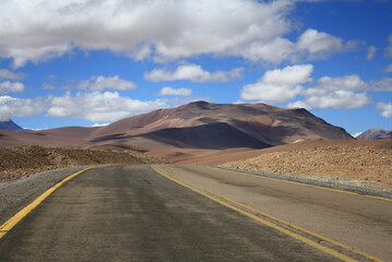 Landscape Or Mountains, sand, And clounds At Atacama Desert In Chile