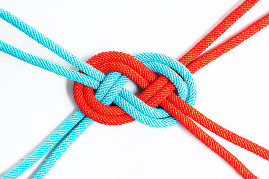 Braided cords shaped into an infinity sign